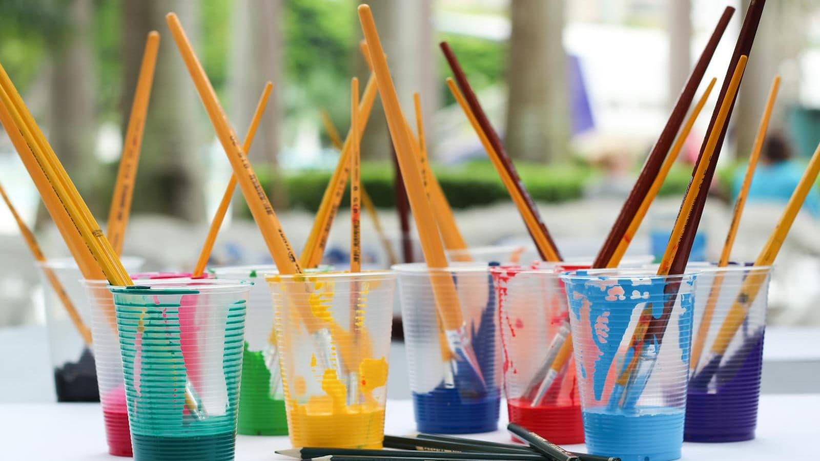 Pain Brushes Inside Clear Plastic Cups