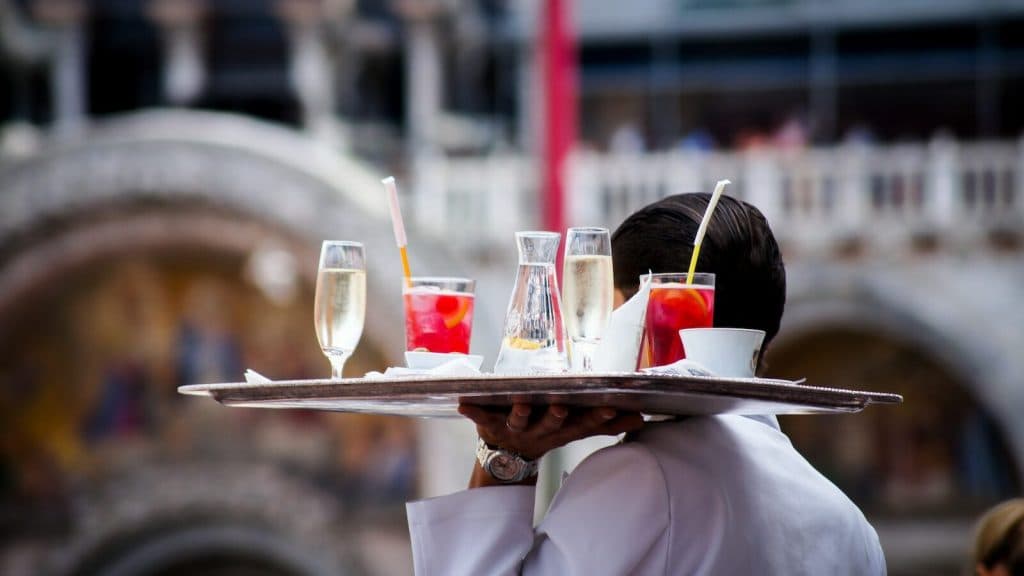 waiter serving beverages