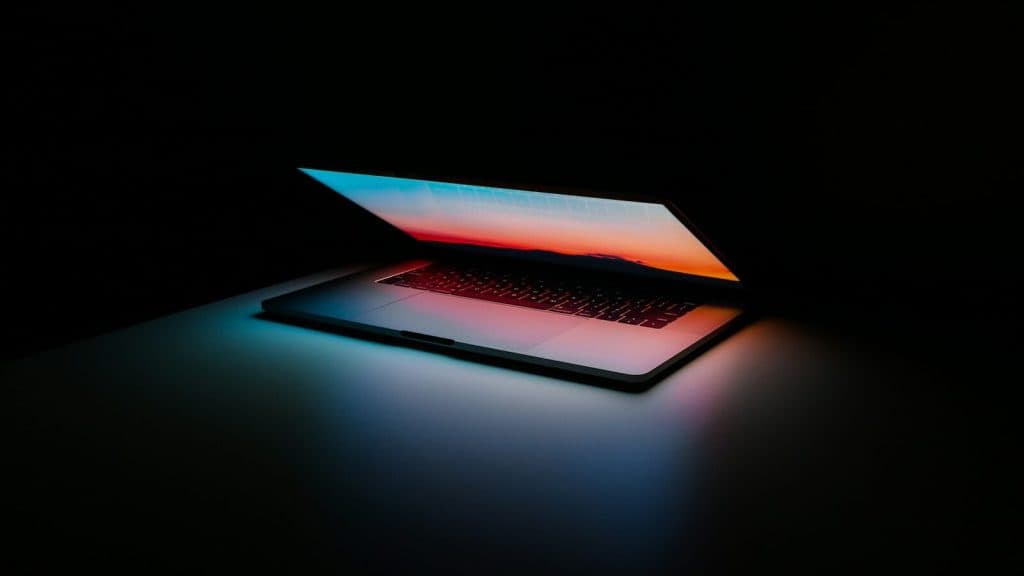 gray and black laptop computer on surface